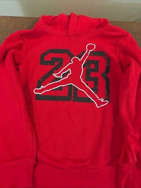 Jordan Kids Red Pullover Hoodie with Black 23 Jumpman Graphic with navy shorts